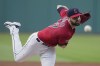 Cleveland Guardians' Lucas Giolito pitches in the first inning of a baseball game against the Minnesota Twins, Monday, Sept. 4, 2023, in Cleveland. (AP Photo/Sue Ogrocki)