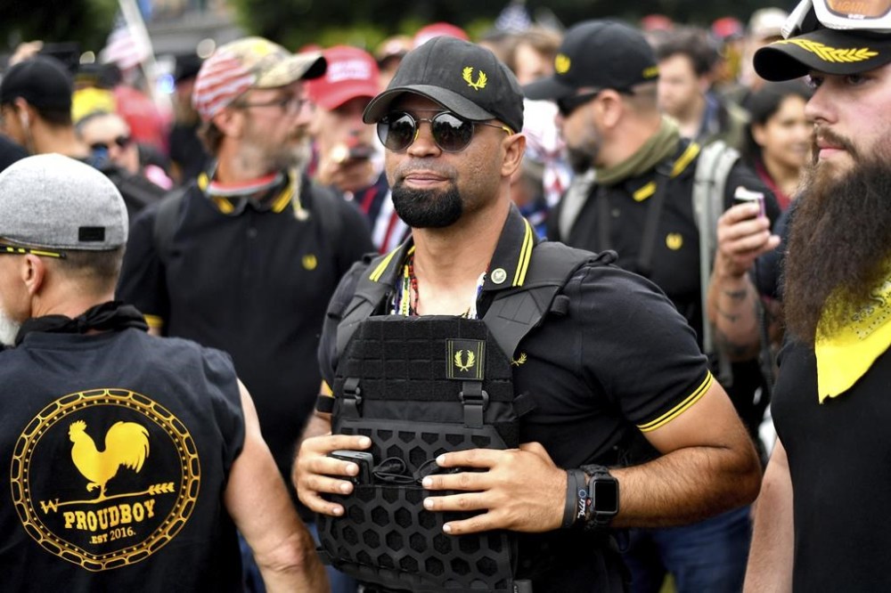 FILE - Proud Boys chairman Enrique Tarrio rallies in Portland, Ore., Aug. 17, 2019. Former Proud Boys national chairman Enrique Tarrio will be sentenced on Tuesday, Sept. 5, 2023, for a plot to attack the U.S. Capitol in a failed bid to stop the transfer of presidential power after Donald Trump lost the 2020 election. (AP Photo/Noah Berger, File)