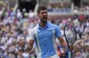 Novak Djokovic, of Serbia, reacts after defeating Taylor Fritz, of the United States, during the quarterfinals of the U.S. Open tennis championships, Tuesday, Sept. 5, 2023, in New York. (AP Photo/Seth Wenig)