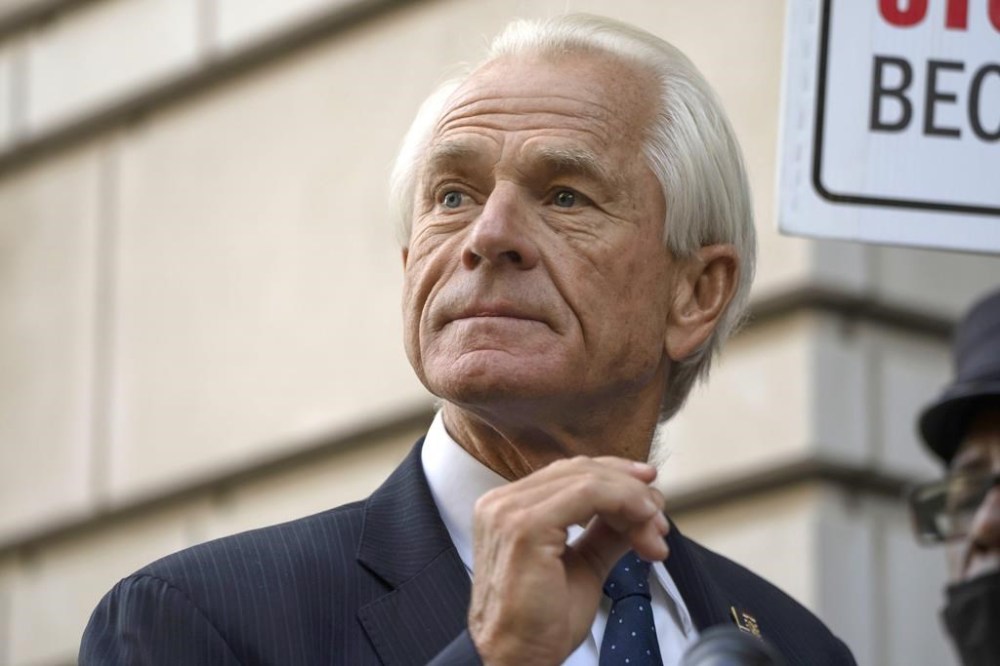 Former White House trade adviser Peter Navarro speaks to the media as he departs federal court, Tuesday, Sept. 5, 2023, in Washington. (AP Photo/Mark Schiefelbein)