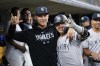 New York Yankees' Gleyber Torres, right, celebrates his home run with Anthony Rizzo, left, in the seventh inning of a baseball game against the Detroit Tigers, Monday, Aug. 28, 2023, in Detroit. (AP Photo/Paul Sancya)
