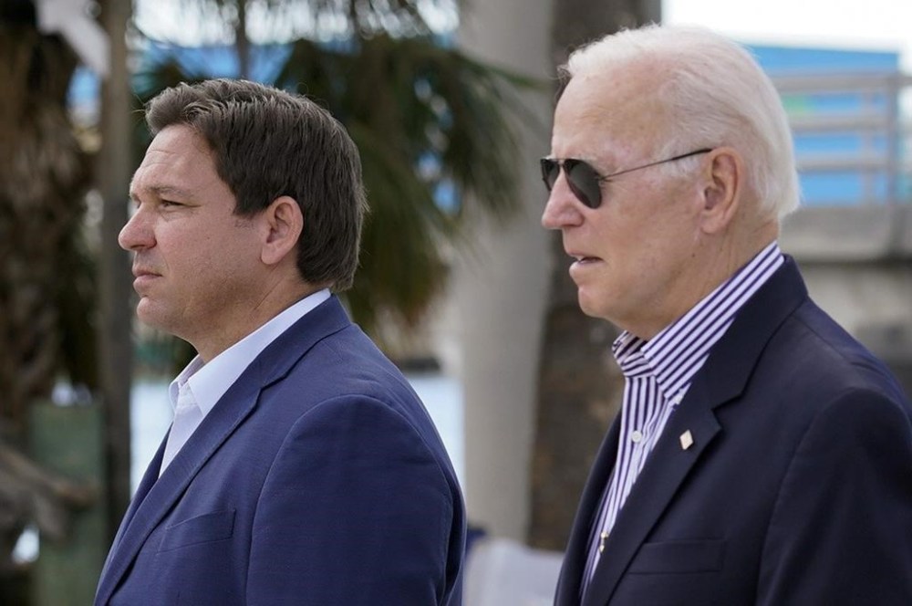 FILE - President Joe Biden and Florida Gov. Ron DeSantis arrive to tour an area impacted by Hurricane Ian on Wednesday, Oct. 5, 2022, in Fort Myers Beach, Fla. (AP Photo/Evan Vucci, File)