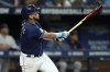 Tampa Bay Rays' Isaac Paredes watches his solo home run off Boston Red Sox pitcher Nick Pivetta during the fourth inning of a baseball game Wednesday, Sept. 6, 2023, in St. Petersburg, Fla. (AP Photo/Chris O'Meara)