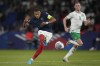 France's Kylian Mbappé (10) shoots wide of goal during the Euro 2024 Group B qualifying soccer match between France and Ireland at Parc des Princes stadium in Paris, Thursday, Sept. 7, 2023. (AP Photo/Michel Euler)