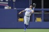 Los Angeles Dodgers left fielder Chris Taylor catches a ball hit by Miami Marlins' Nick Fortes during the ninth inning of a baseball game, Thursday, Sept. 7, 2023, in Miami. (AP Photo/Wilfredo Lee)
