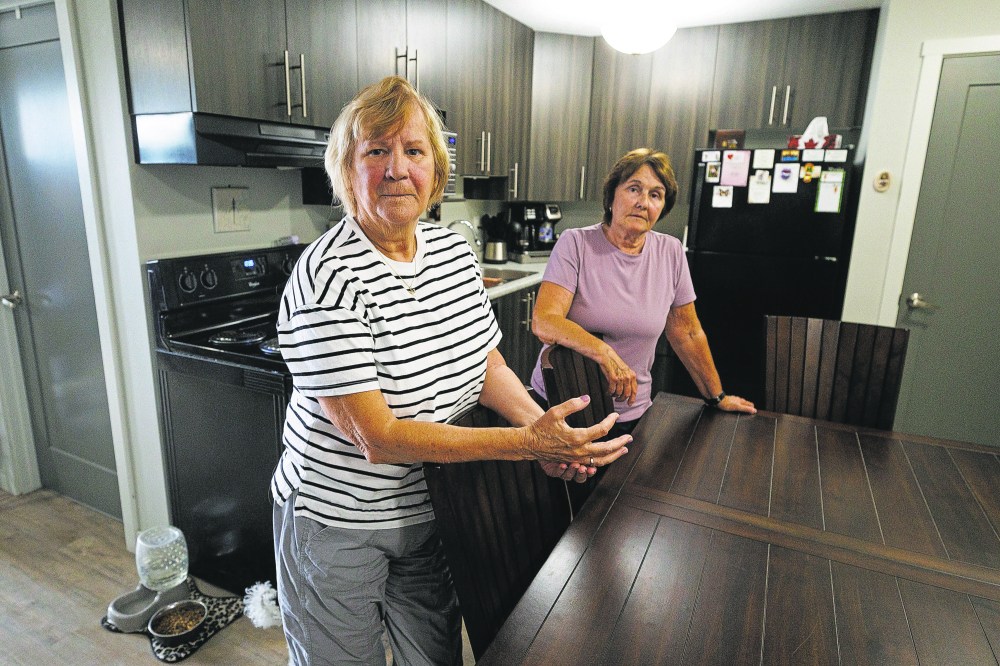 MIKE DEAL / WINNIPEG FREE PRESS
Judy Panchenko (left) and her longtime partner Cheryl Cook (right) were sitting at home when Winnipeg police officers came to their door and said their grandson, Peter Panchenko, was dead.