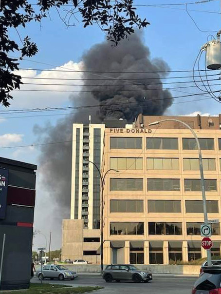 SUPPLIED
Heavy black smoke and flames were observed coming from the roof at 221 Stradbrook Ave.