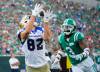 HEYWOOD YU / THE CANADIAN PRESS
                                Winnipeg Blue Bombers receiver Drew Wolitarsky (82) catches for a touchdown as Saskatchewan Roughriders defensive back Nic Marshall (3) looks on during the first half of CFL Labour Day Classic football action in Regina, Sunday.