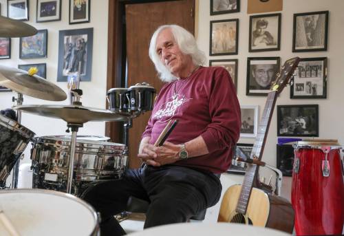 Len Fidkalo, with his drum kit, the same one he&rsquo;s been banging away on for 50-plus years, with walls of memorabilia in his basement, chronicling his long, colourful career. (Ruth Bonneville / Winnipeg Free Press)