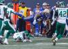 Winnipeg Blue Bombers’ Brady Oliveira (20) runs for the first down against the Saskatchewan Roughriders during the first half of Saturday’s game. (John Woods/The Canadian Press)