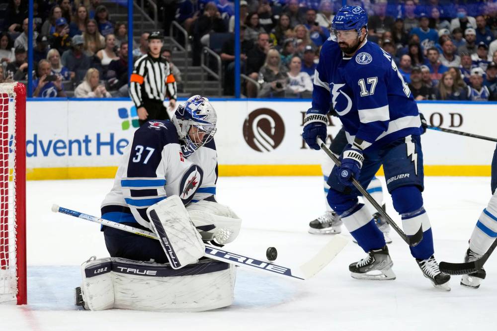 Chris O’Meara / The Associated Press files
Jets goaltender Connor Hellebuyck (above) and centre Mark Scheifele are scheduled to become unrestricted free agents at the end of the 2023-24 NHL season.