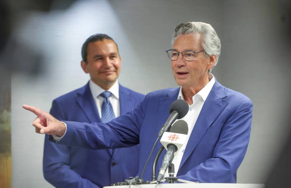 RUTH BONNEVILLE / WINNIPEG FREE PRESS
Manitoba NDP Leader Wab Kinew, left, and and former premier of Manitoba, Gary Doer. Doer’s endorsement of Kinew is unlikely to sway many voters’ allegiance to the NDP, but another endorsement Lloyd Axworthy may have noticeable impact.