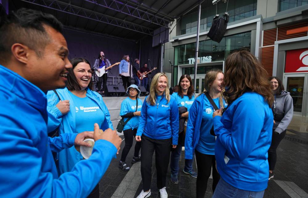 RUTH BONNEVILLE / WINNIPEG FREE PRESS
United Way Winnipeg volunteers celebrate to the music of Indian City on stage at the kick off for the Walk This Way Finish Line + 2023 Fundraising Campaign.