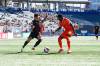 Valour FC winger Jared Ulloa (left) moves the ball against a Hamilton defender Sunday afternoon at IG Field. (Supplied)