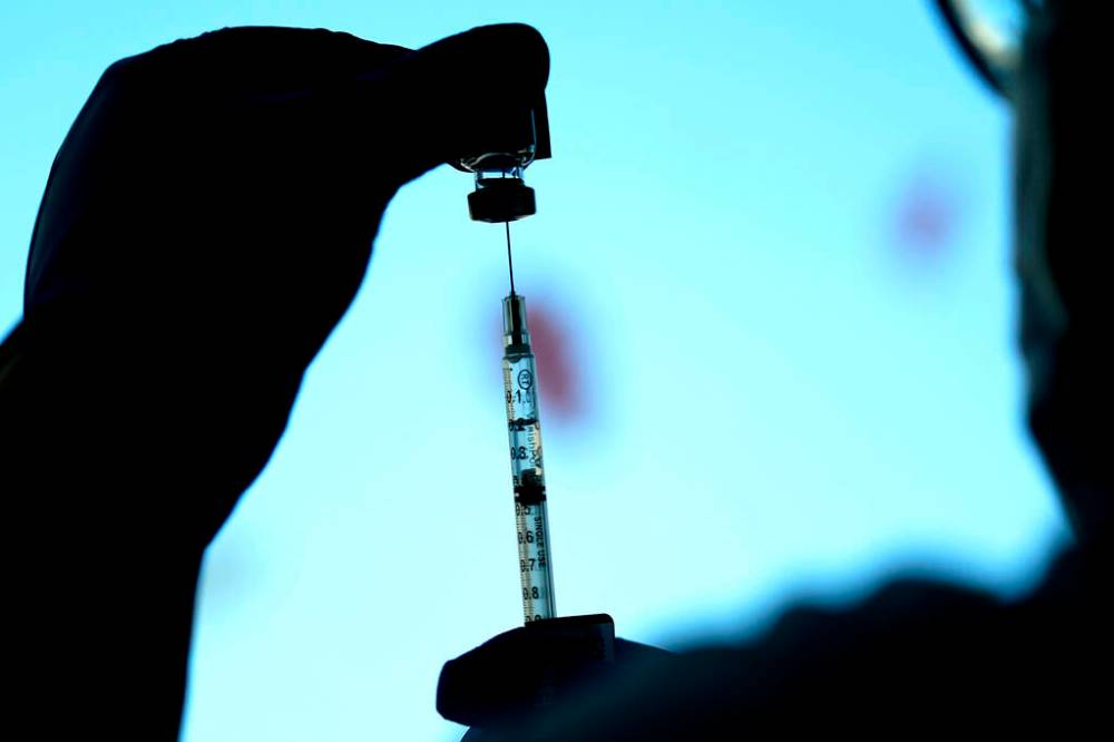 The vaccines will first be rolled out to personal-care home residents, hospital patients and Indigenous residents before they become available to the general public. (Nam Y. Huh / The Associated Press files)