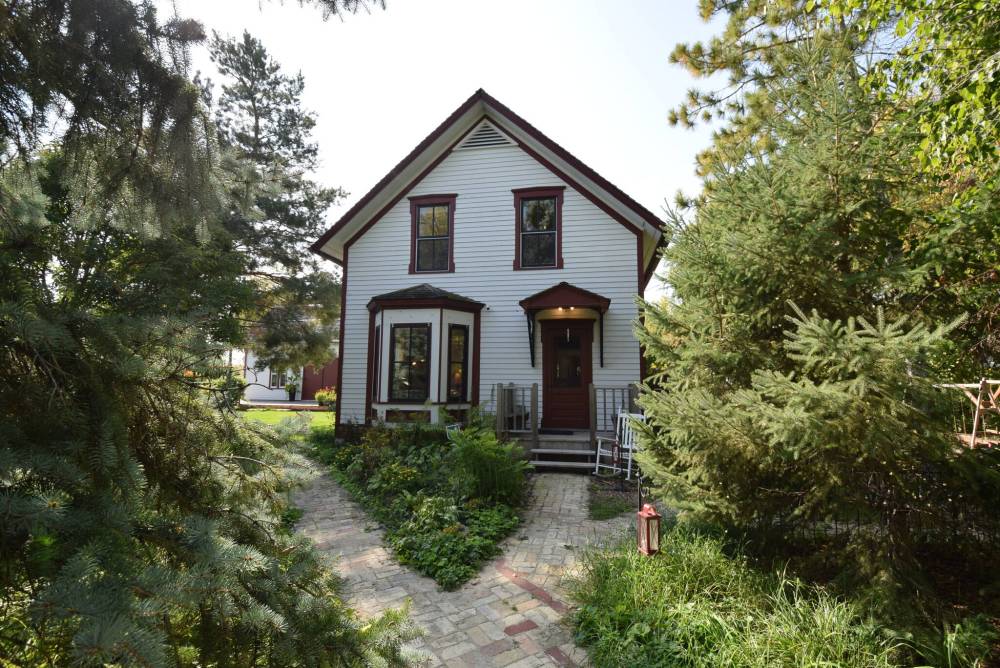 The 150-year-old historic home deftly balances past charms with modern amenities.