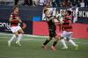 BROOK JONES / WINNIPEG FREE PRESS
                                Valour FC attacker Walter Benjamin Ponce Gallardo (centre) and Vancouver FC attacker Gabriel Bitar fight for the ball Wednesday night at IG Field.