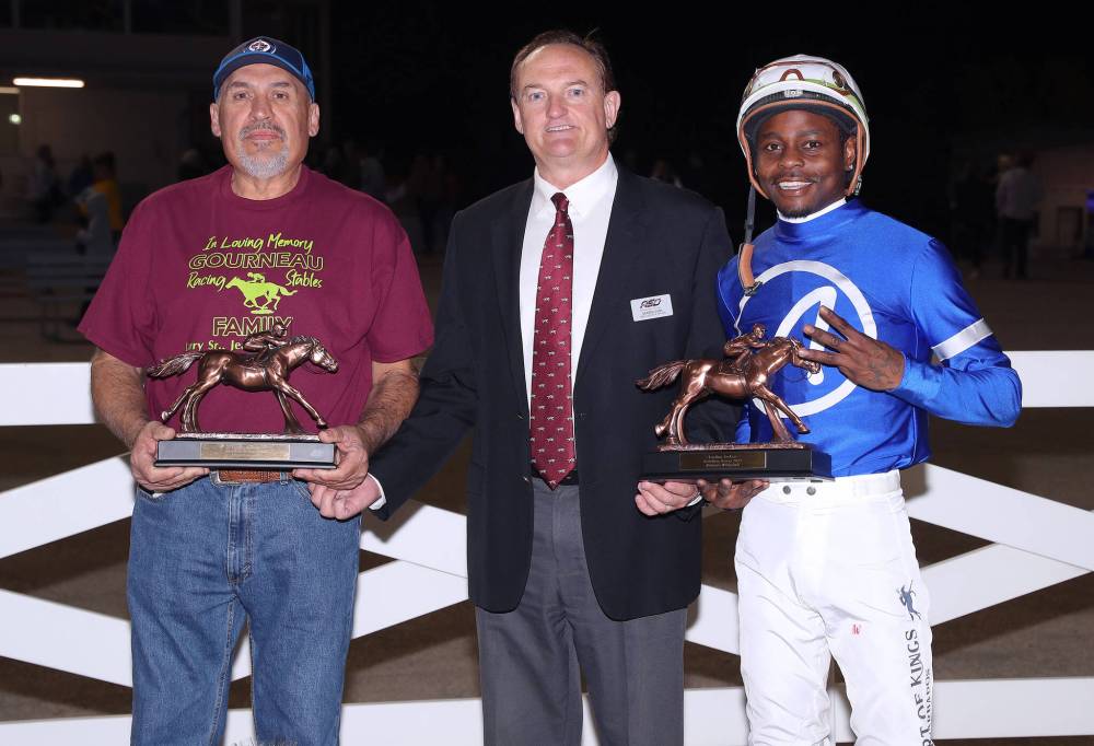 JASON HALSTEAD / ASSINIBOIA DOWNS
Assiniboia Downs 2023 Champions, from left: leading trainer Jerry Gourneau, Downs CEO Darren Dunn, leading rider Antonio Whitehall.