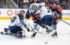 THE CANADIAN PRESS/Jason Franson
                                Winnipeg Jets goalie Collin Delia (60) makes a save on Edmonton Oilers’ Drake Caggiula (8) during second period NHL preseason action in Edmonton on Sunday.
