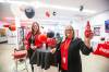 MIKAELA MACKENZIE / WINNIPEG FREE PRESS
                                Teresa Woyna, general manager (left), and Nina Patenaude, administrative coordinator, celebrate Coca-Cola Canada Bottling’s acquisition of previously American-owned plants.