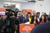 NDP Leader Wab Kinew flanked by party members at the Tuxedo Community Centre earlier this month. (Tyler Searle / Winnipeg Free Press)