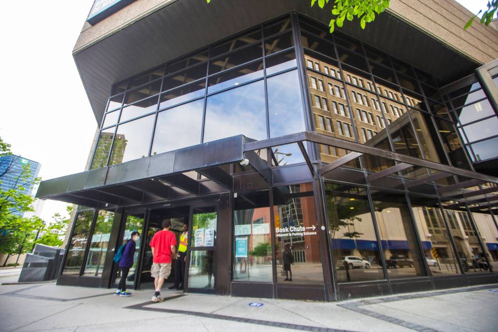 WINNIPEG FREE PRESS FILES
Visitors to the library Tuesday shared mixed views on the shift from police to community safety hosts.