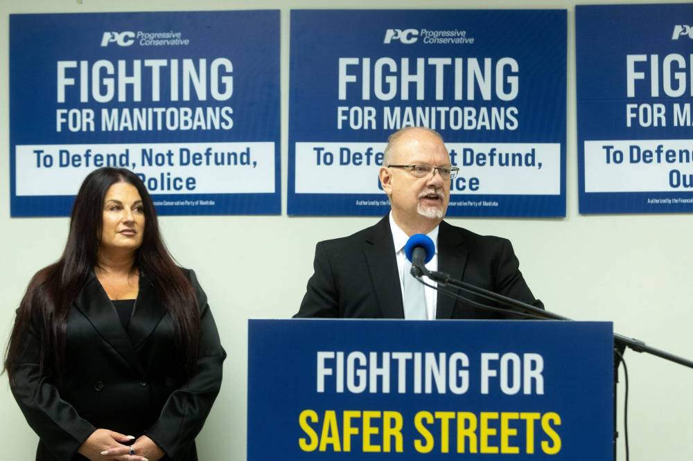 MIKE DEAL / WINNIPEG FREE PRESS
Kelvin Goertzen, PC candidate for Steinbach, and Réjeanne Caron, PC candidate for Fort Rouge, for a campaign announcement at the PC Party Headquarters Friday.