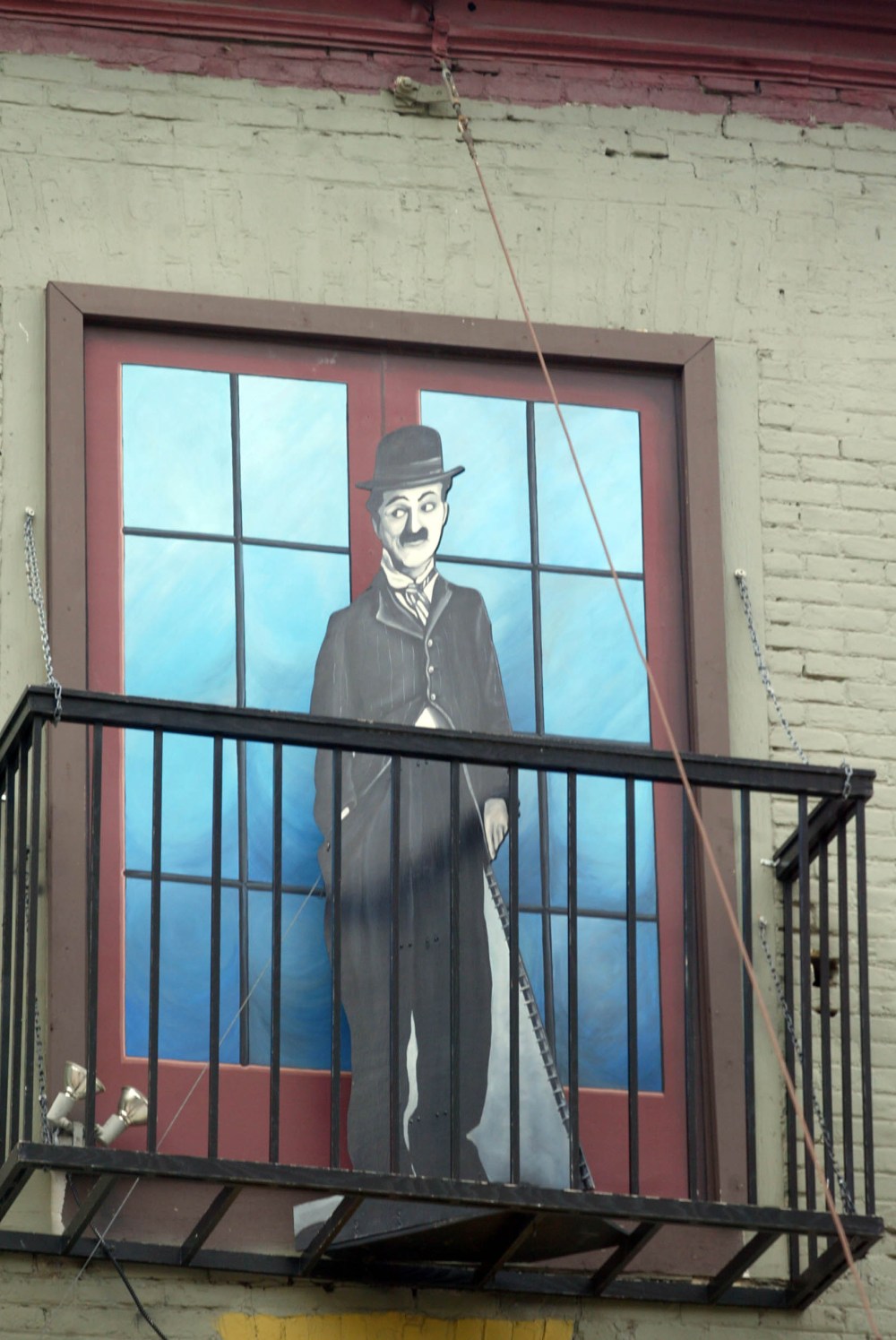 Charlie Chaplin's cut out at Windsor Hotel balcony. (Marc Gallant / Winnipeg Free Press files)
