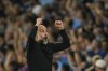 Manchester City's head coach Pep Guardiola celebrates after Manchester City's Julian Alvarez scoring his side's opening goal during the English Premier League soccer match between Manchester City and Newcastle at the Etihad stadium in Manchester, England, Saturday, Aug. 19, 2023. (AP Photo/Dave Thompson)
