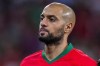 FILE - Morocco's Sofyan Amrabat during the International friendly soccer match between Morocco and Peru at the Civitas Metropolitano stadium in Madrid, Spain, Tuesday, March 28, 2023. Manchester United seems like the likely destination for Fiorentina midfielder Sofyan Amrabat. The English club is reportedly set to pay 10 million euros ($11 million) for an initial loan deal with an option to buy the Morocco international for a further 20 million euros ($22 million). (AP Photo/Manu Fernandez, File)