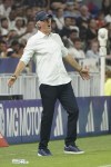 Lyon's head coach Laurent Blanc reacts during the French League One soccer match between Lyon and Paris Saint-Germain at the Groupama stadium, outside Lyon, France, Sunday, Sept. 3, 2023. (AP Photo/Laurent Cipriani)
