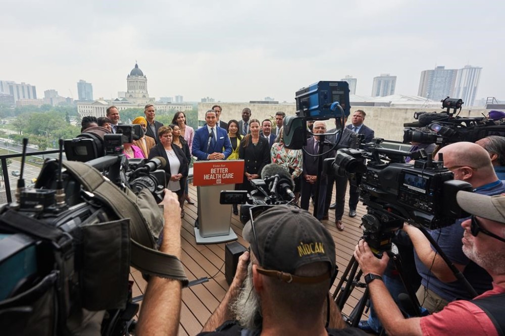 Manitoba NDP Leader Wab Kinew speaks to media during a press conference to kick off the 2023 Manitoba election campaign at the West Broadway Commons in Winnipeg on Tuesday, September 5, 2023. THE CANADIAN PRESS/David Lipnowski
