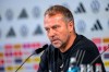 National coach Hansi Flick speaks at the press conference in Wolfsburg, Germany, Friday, Sept. 8, 2023. Germany coach Hansi Flick needs his team to start winning games quick to be sure of keeping his job ahead of the European Championship next year. Germany hosts the tournament next summer, but Flick’s team has been floundering and the former Bayern Munich coach is under pressure to show he can finally turn Germany’s fortunes around to avoid embarrassment as Euro 2024 host.(David Inderlied/dpa via AP)