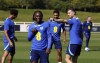 England's Jordan Henderson, right, attends a training with teammates at St. George's Park, Burton upon Trent, England, Tuesday Sept. 5, 2023. (Martin Rickett/PA via AP)