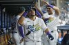 Tampa Bay Rays' Rene Pinto celebrates in the dugout after his two-run home run off Seattle Mariners starting pitcher George Kirby during the seventh inning of a baseball game Friday, Sept. 8, 2023, in St. Petersburg, Fla. (AP Photo/Chris O'Meara)