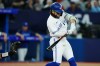 Toronto Blue Jays' Bo Bichette (11) hits an RBI double against the Kansas City Royals during sixth inning American League MLB baseball action in Toronto on Friday, September 8, 2023. THE CANADIAN PRESS/Nathan Denette