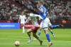 Poland's Piotr Zielinski, left, fights for the ball with the Faroe Islands Hordur Askham during the Euro 2024 group E qualifying soccer match between Poland and Faroe Islands at National stadium in Warsaw, Poland, Thursday Sept. 7, 2023. (AP Photo/Czarek Sokolowski)