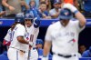 Toronto Blue Jays right fielder George Springer (4) celebrates his solo home run with teammate Vladimir Guerrero Jr. (27) during fourth inning MLB baseball action against the Kansas City Royals, in Toronto, Saturday, Sept. 9, 2023. THE CANADIAN PRESS/Nathan Denette