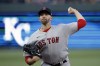 Boston Red Sox pitcher James Paxton throws during the first inning of the team's baseball game against the Kansas City Royals in Kansas City, Mo., Friday, Sept. 1, 2023. (AP Photo/Colin E. Braley)
