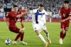 Denmark's Joakim Maehle, left,and Christian Norgaard, right, challenge for the ball with Finland's Benjamin Kaellman, center, during the Euro 2024 group H qualifying soccer match between Finland and Denmark in Helsinki, Finland, Sunday, Sept. 10, 2023. (Heikki Saukkomaa/Lehtikuva via AP)