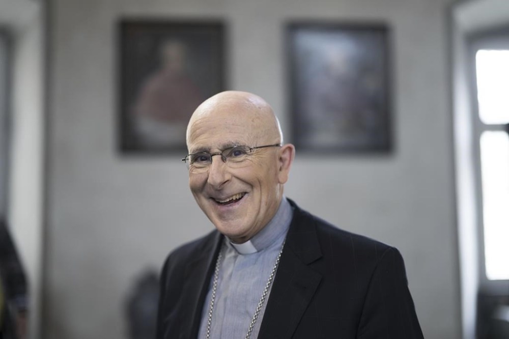 Swiss Bishop Joseph Bonnemain is pictured during a press conference in Chur, Switzerland, Tuesday, April 5, 2022. The Vatican has ordered an investigation into high-ranking Catholic clerics in Switzerland in connection with sexual abuse, the Swiss Bishops' Conference said on Sunday. According to the bishops' conference, the Vatican received a letter with the allegations in May and subsequently appointed Swiss Bishop Joseph Bonnemain to head a preliminary investigation in June. (Gian Ehrenzeller/Keystone via AP)