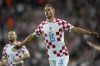 Croatia's Mario Pašalic celebrates after scoring his side's fifth goal during the Euro 2024 group D qualifying soccer match between Croatia and Latvia at Rujevica stadium in Rijeka, Croatia, Friday, Sept. 8, 2023. (AP Photo/Darko Bandic)