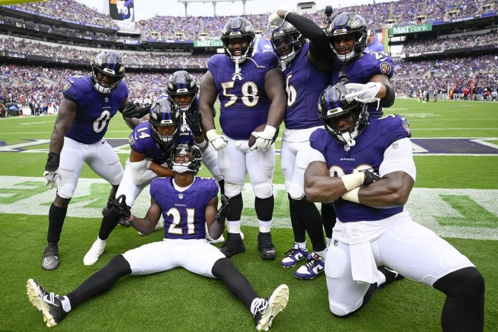 The Baltimore Ravens defense cel;ebrates after a fumble recovery during the second half of an NFL football game against the Houston Texans Sunday, Sept. 10, 2023, in Baltimore. (AP Photo/Nick Wass)