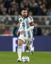 Argentina's Lionel Messi, runs with the ball during a qualifying soccer match against Ecuador for the FIFA World Cup 2026, at Monumental stadium in Buenos Aires, Argentina, Thursday, Sept. 7, 2023. (AP Photo/Natacha Pisarenko)