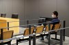 FILE - Portuguese hacker Rui Pinto sits in the courtroom at the start of his trial in Lisbon, Friday, Sept. 4, 2020. A Portuguese hacker whose bombshell revelations on the “Football Leaks” website rocked European soccer has been convicted by a Lisbon court of nine crimes and given a suspended prison sentence of four years. Portuguese media reported on Monday, Sept. 11, 2023 that the three-judge panel found Rui Pinto guilty on five counts of unauthorized entry into computer systems, three counts of intercepting correspondence for accessing emails, and one count of attempted extortion (AP Photo/Armando Franca, File)