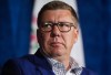 Saskatchewan Premier Scott Moe listens during a news conference, in Whistler, B.C., on Tuesday, June 27, 2023. Moe's government is accusing Prime Minister Justin Trudeau of damaging relations with India and keeping the provinces in the dark about trade talks.THE CANADIAN PRESS/Darryl Dyck