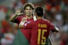 Portugal's Ricardo Horta celebrates with Joao Felix, left, after scoring his side's sixth goal during the Euro 2024 group J qualifying soccer match between Portugal and Luxembourg at the Algarve stadium outside Faro, Portugal, Monday, Sept. 11, 2023. (AP Photo/Joao Matos)