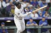 Colorado Rockies' Elehuris Montero singles against Chicago Cubs starting pitcher Jordan Wicks in the second inning of a baseball game, Monday, Sept. 11, 2023, in Denver. (AP Photo/David Zalubowski)