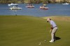 FILE - Kevin Kisner sinks a putt on the 14th green during the quarterfinal round of the Dell Technologies Match Play Championship golf tournament, Saturday, March 26, 2022, in Austin, Texas. Kisner ended last year at No. 31 in the world ranking. Now he is at No. 112. (AP Photo/Tony Gutierrez, File)