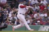 Boston Red Sox's Rafael Devers, right, hits a home run as New York Yankees catcher Kyle Higashioka, left, looks on in the fourth inning of the first game of a baseball doubleheader Tuesday, Sept. 12, 2023, in Boston. (AP Photo/Steven Senne)